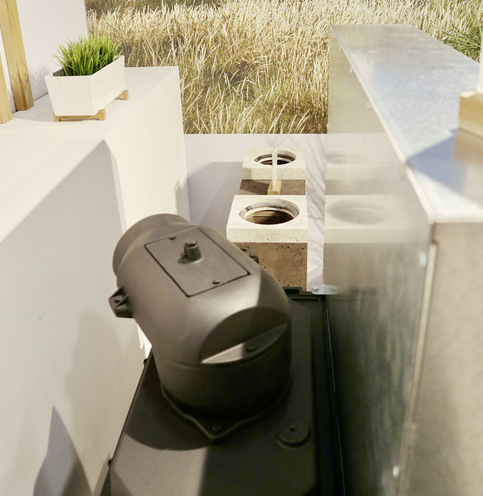 Neuer Abgangsstutzen am „TIGA H F 80N“ zum Anschluss ans keramische Zugsystem „LWS“. Für Scheitholzlängen bis zu 50 cm.