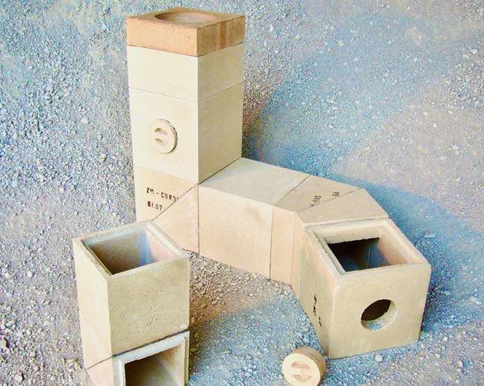 Aus Rath Schamotte können auch die keramische Zugsysteme erstellt werden. Da diese sind thermisch nicht so belastet sind wie der Brennraum, weshalb hier auch einfachere Schamottequalitäten eingesetzt werden können.