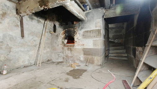 Als ob nichts gewesen wäre … der „benutzte Charakter“ des Backofens wurde im Denkmalsinn erhalten.