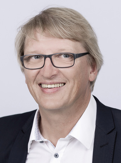 Uwe Schumann, ­Leitung Verbands­arbeit & Wissens­management ­PLUGGIT –Die Wohnraum­lüftung.